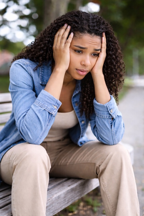 Person feeling overwhelmed and fragmented